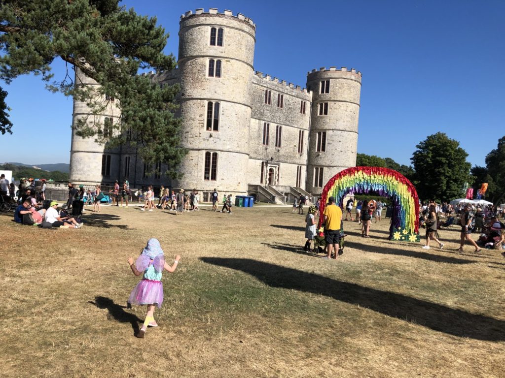 A giant rainbow frame sums this festival's joy up completely
